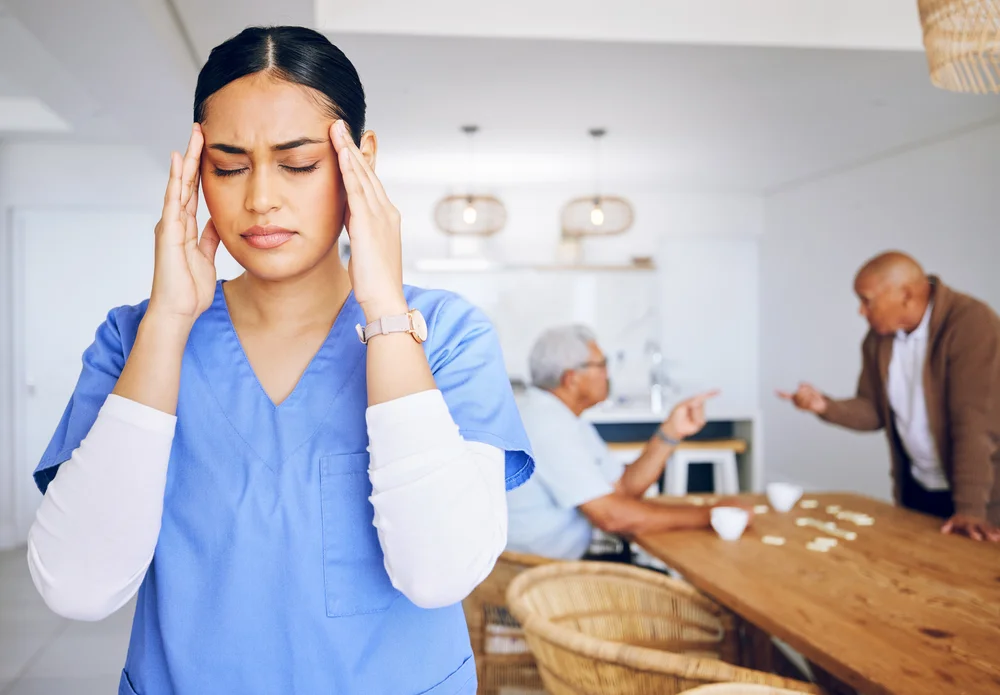 Caregiver, nurse and headache from stress in working with elderly